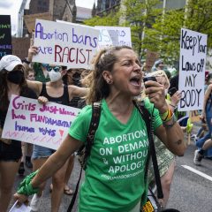 BOSTON, MA - 5/13/2022 Ryan Hendricks, a member of Rise Up 4 Abortion Rights, leads protestors in a chant as they march down Boylston Street to Boston Common on Saturday  in protest of the leaked draft Supreme Court decision that would overturn Roe v. Wade. Erin Clark/Globe Staff 



TOPIC: 15ROE